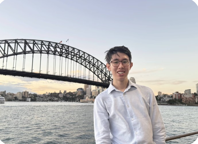 Jamie in front of the Sydney Harbour Bridge